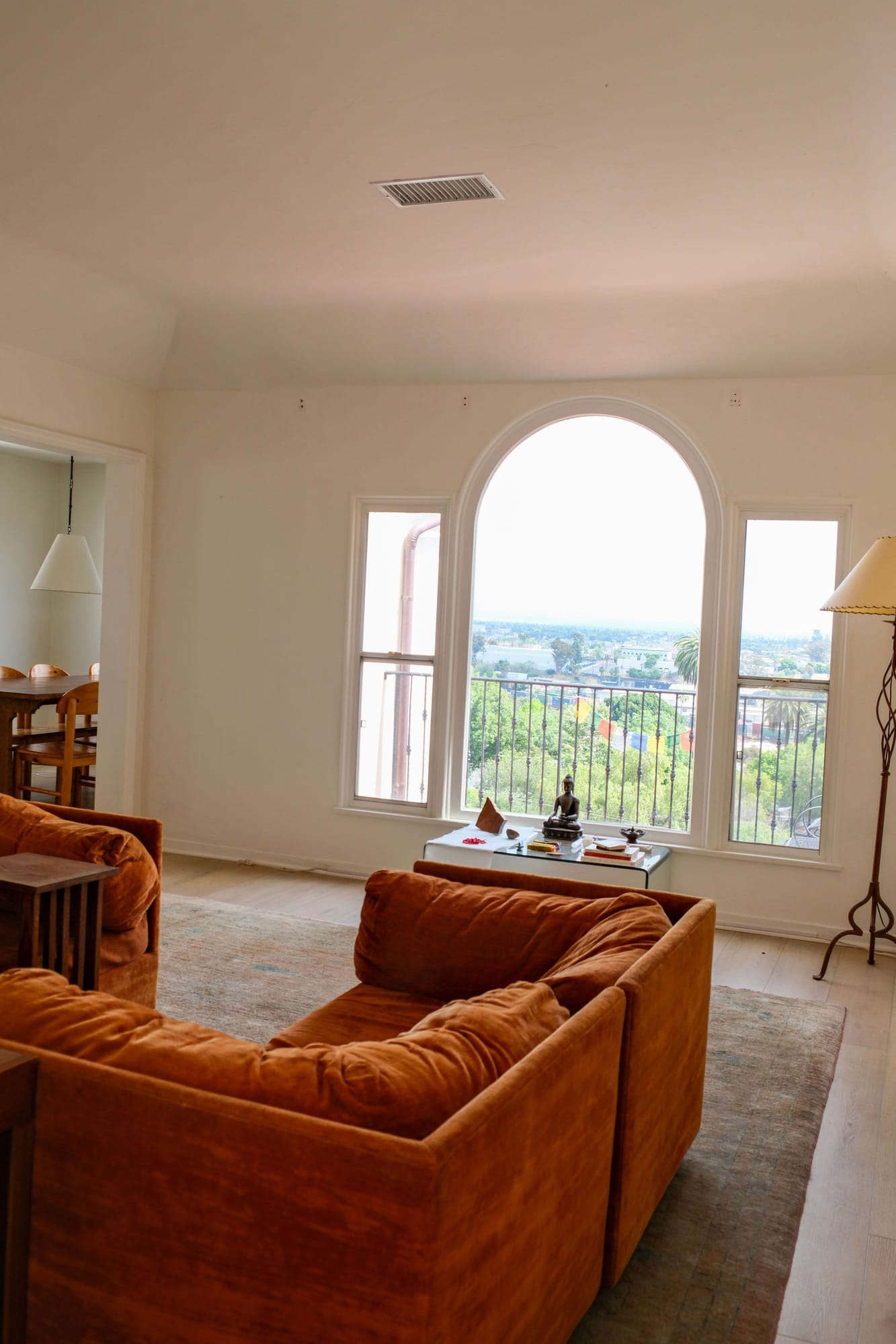 Living room with the arched window and view